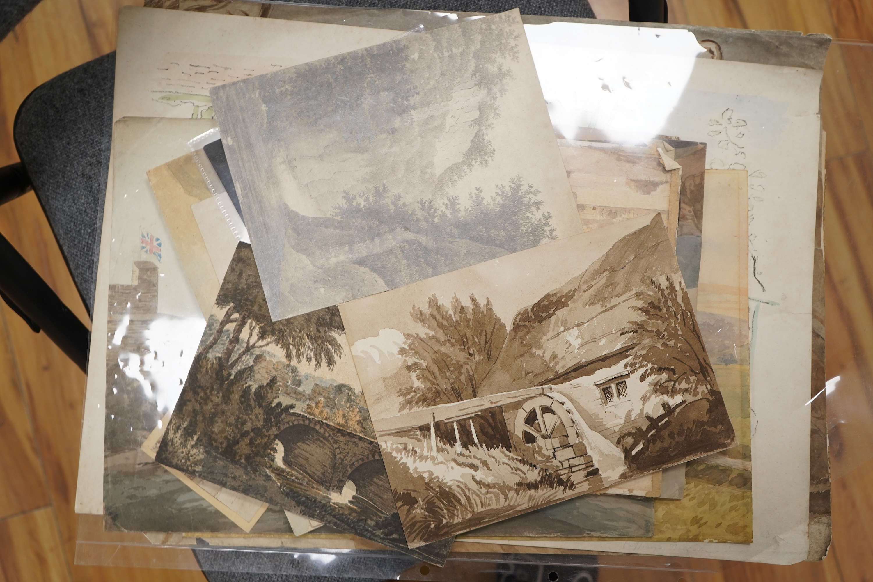 A collection of 18th and 19th century inks, watercolours and pencil sketches, predominantly landscapes and figural works, unsigned, unframed, largest 34 x 46cm
